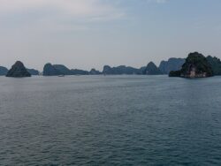 Limestone islands and boats in Ha Long Bay
